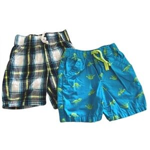 Boys 3t shorts, both with draw string. Dark blue plaid, blue with green dinos